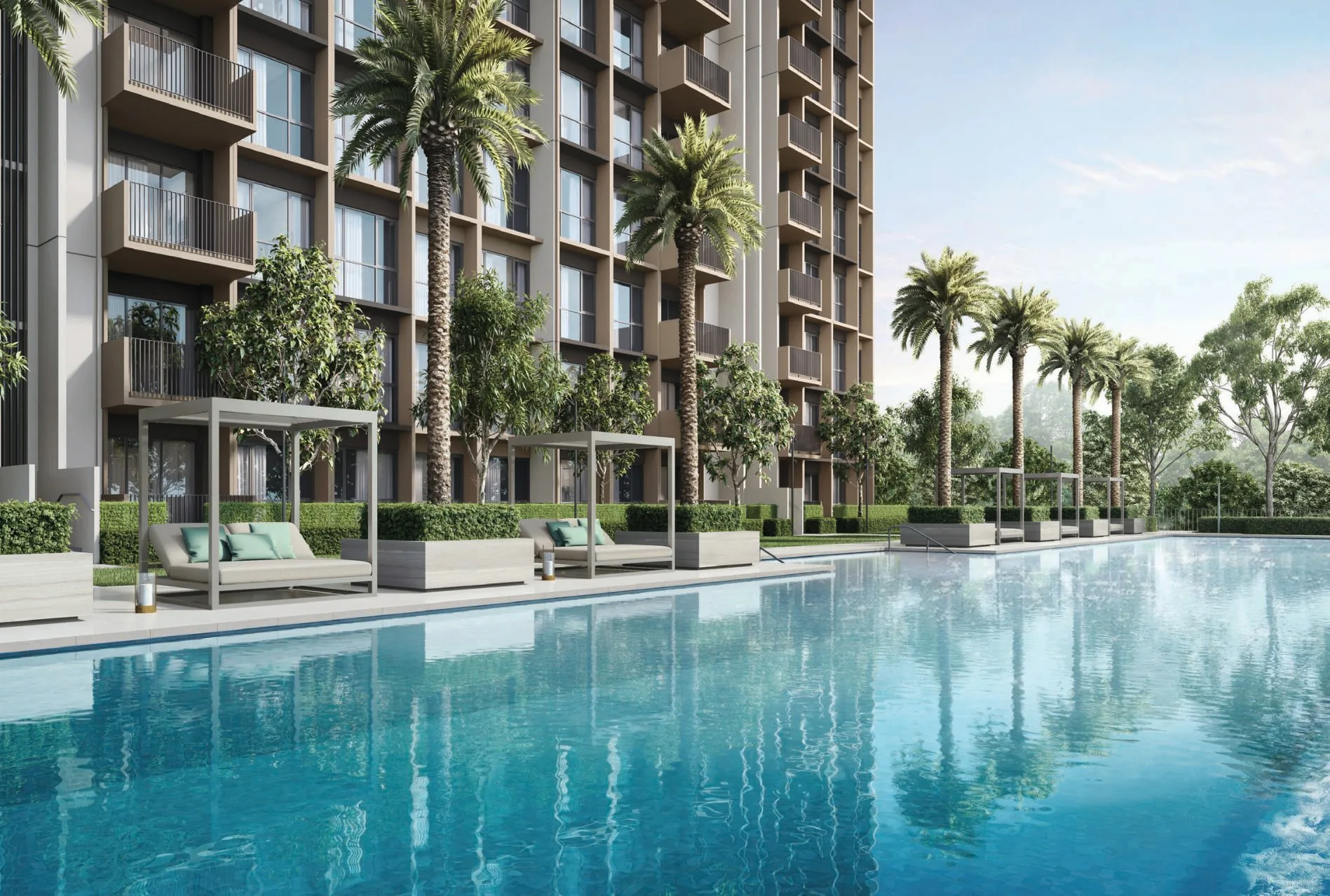 Coastal Cabana, artist&rsquo;s impression: the 50-metre Lifestyle Pool lined with palms and cabana loungers at the foot of the blocks